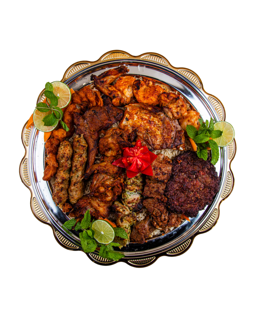 A lavish Tikka Tonight platter featuring an assortment of grilled delicacies: two types of chicken items, three varieties of mutton, chapli kebab, fish, and quail, all artfully arranged and garnished with fresh herbs and lemon wedges.